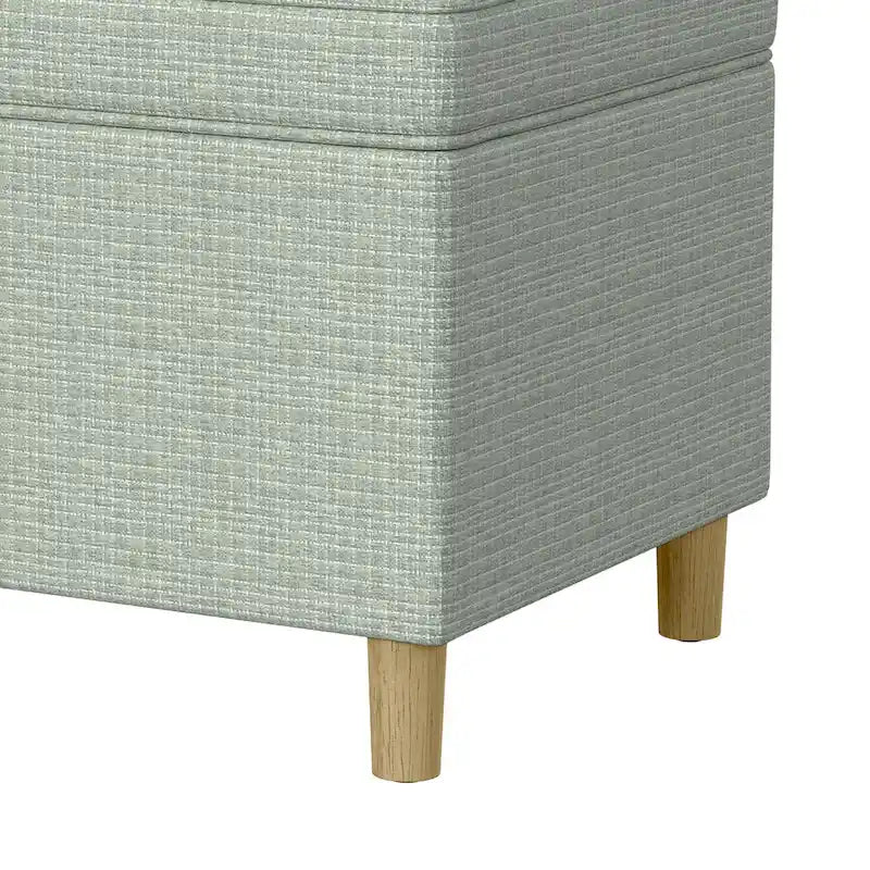 Pouf de rangement tissé vert sauge avec dessus relevable, espace de rangement dissimulé et pieds en bois marron