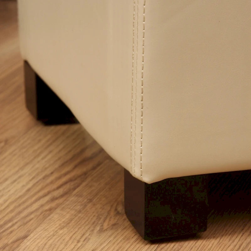 Banc de rangement capitonné en similicuir ivoire avec pieds en bois de chêne foncé